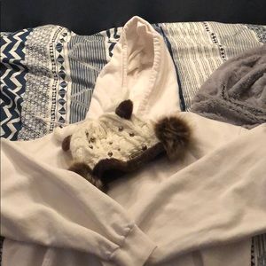White hoodie and antler beanie